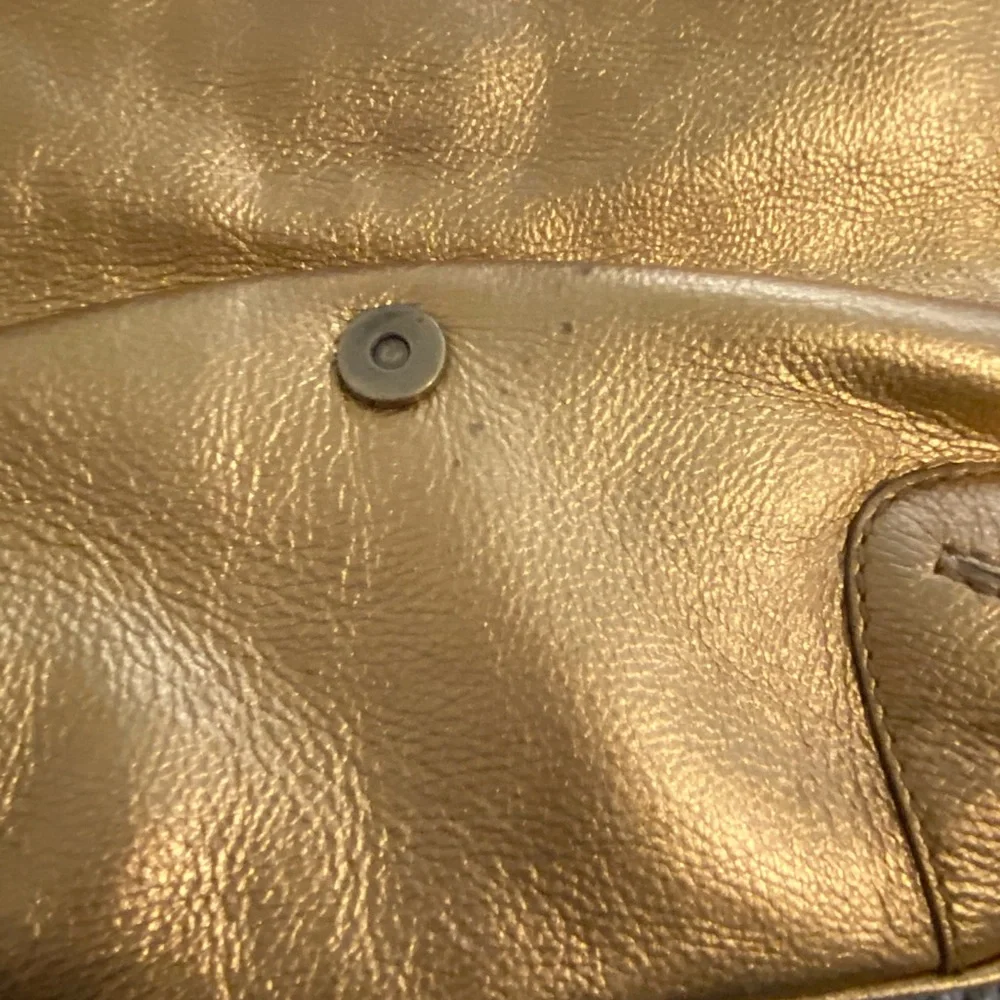 Michael Kors Gold hobo purse